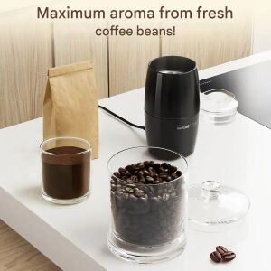 Clatronic coffee grinder with coffee beans and ground coffee, showcasing maximum aroma - Clatronic