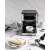 Gorenje ESCM15DBK espresso machine with coffee and cheesecake