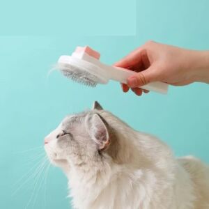 Perie de îndepărtare a părului de animale de companie în uz pe o pisică, perie slicker cu autocurățare - Perie pentru animale, mașină de tuns, foarfece, mașină de tăiat gheare