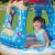 Close-up of Bestway Candyville Inflatable Baby Pool with Sunshade, happy child
