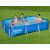 Family swimming in Bestway Steel Pro rectangular pool in garden