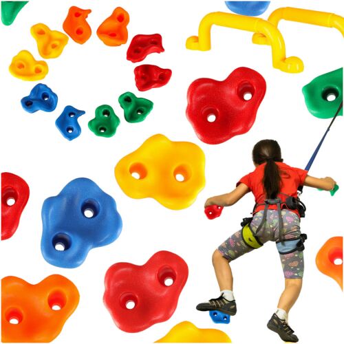 Child climbing on wall with colorful climbing holds.