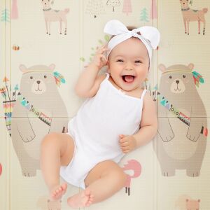 Happy baby playing on PETITE&MARS Campy Arabesca play mat with bear design - Baby Gyms & Play Mat