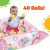 Baby playing in Bright Starts Rainbow Tropics Ball Pit with 40 Balls