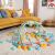 Bright Starts Tropical play gym in living room setting, 5-in-1 activity center