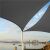 Springos graphite shade sail providing shade over a patio with a view