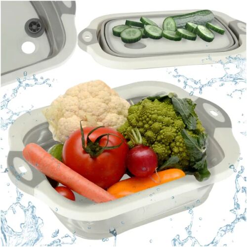 Foldable 4-in-1 silicone washing bowl in use as cutting board and washing bowl