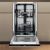 Open Whirlpool WH2IC10BS7LA0 Built-in Dishwasher showing interior