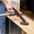 Using MPM MOD-61 vacuum cleaner with brush attachment on furniture