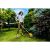Woman Using Riwall PRO RALT 3040 Cordless Grass Trimmer in Garden