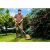 Man Using Riwall PRO RALT 3040 Cordless Grass Trimmer