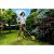 Riwall PRO RALT 3040 Cordless Grass Trimmer being used by a woman