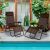 Two Pepita Zero Gravity Relax Chairs by the pool, dark brown