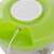 Green manual food chopper with stainless steel blade, close-up of the cord