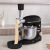 Berlinger Haus Black Rose stand mixer extruding pasta, black and rose gold