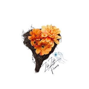 Szív alakú sírdísz narancs virágokkal