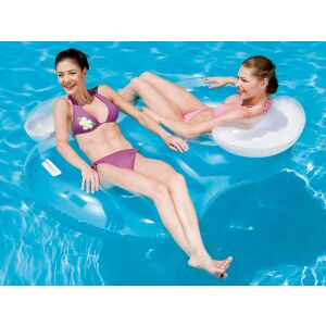 Two women relaxing on a Bestway double inflatable pool lounger in a pool - Beach mattress