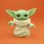 Hasbro Star Wars Mandalorian Grogu Mixin' Moods figura narancssárga háttérrel