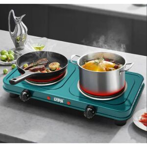 Winning Star Doppelkochplatte in Gebrauch beim Kochen von Speisen - Mikrowellenherde, Dunstabzugshauben und Kochplatten