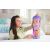 Mattel Disney Princess Rapunzel Spin & Reveal baba csomagolása egy lánnyal
