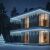 Modern house decorated with Pepita cold white icicle string lights for Christmas