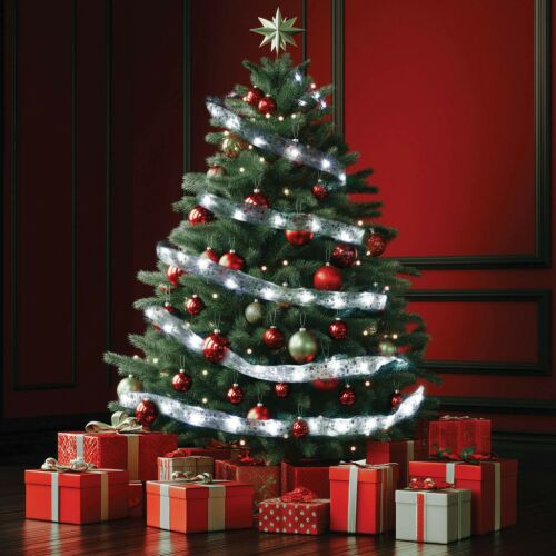 Home RLS10WH LED ribbon light decorating a Christmas tree with presents.