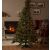 Pepita Kanada Lux Premium 1.9m Artificial Christmas Tree decorated with lights in a living room setting