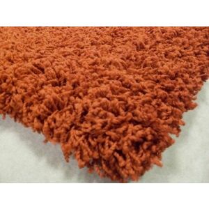 Bakero Shaggy Luna Terra Teppich, Nahaufnahme der orangefarbenen Zottelteppichstruktur - Wandpaneele & Wandaufkleber, Teppiche und Tischdecken