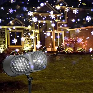LED коледен лазерен проектор, показващ снежинки на къща - Коледа