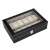 Black leather watch box with 12 compartments and a glass lid