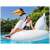 Woman relaxing on Intex Mega Swan Island inflatable pool float in a swimming pool