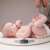 Chicco baby scale with weight stabilization feature, baby being weighed on the scale