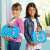 Two girls holding Aquabeads Beginner Carry Case complete set