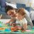 Mother and Baby Playing on Fisher-Price Play Mat