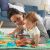 Mother and Baby Playing on Fisher-Price Play Mat
