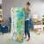 Fisher-Price Extra Big Adventures Play Mat, a large play mat with colorful animals and activities for babies, being unfolded