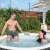 Couple relaxing in a Lay-Z-Spa inflatable hot tub with headrests