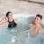 Couple relaxing in a Lay-Z-Spa inflatable hot tub with headrests