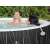People relaxing in a Lay-Z-Spa inflatable hot tub with headrests