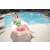 Woman relaxing on Bestway SMA 037 inflatable beach chair by the pool