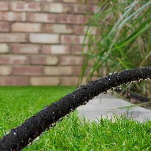 Garden of Eden 11349 Drip Irrigation Hose in use, water dripping - Irrigation