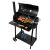 Mega-M faszenes grill használat közben, étel a grillen