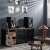 Edifier R2850DB 2.0 speakers, black, in a home setting