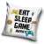 Gamer vankúš s nápisom "Eat Sleep Game Repeat" a dizajnom gamepadu