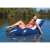 Woman relaxing on Intex inflatable lounge chair in the lake
