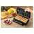 Sencor SSM 9976GD waffle maker in use, making waffles