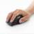 Hand holding Logitech M705 Wireless Laser Mouse, Charcoal