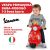 Toddler riding a red Vespa Primavera ride-on scooter