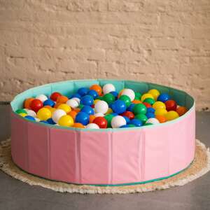 Euro-Matic BPA free plastic play balls in a pink and green ball pit - Plastic Ball Set