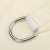 Close-up of stainless steel ring on Napvitorla sun sail, beige color, waterproof polyester